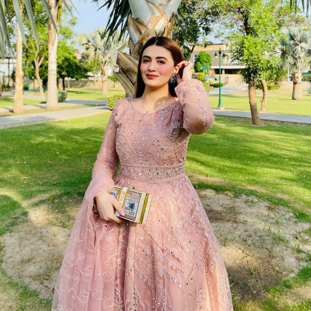 Luxury pink embroidered maxi – women’s wedding guest outfit with elegant detailing